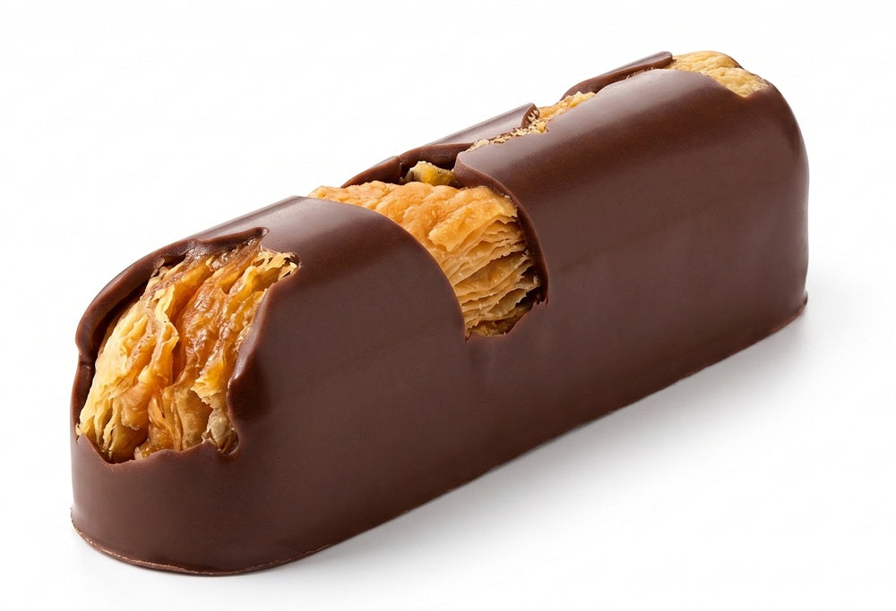A single milk chocolate finger topped with a strip of dried mango.