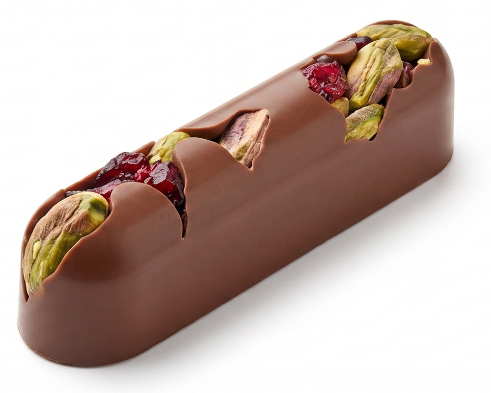 A single milk chocolate finger topped with pistachios and dried cranberries.